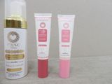 a bottle of lotion and a tube of lotion next to each other