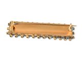 gold plated metal hair clip with beads and beads on it