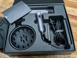 a black box with a hair dryer and a charger in it