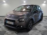 la citrole grise est garée dans le garage sur un sol en damier