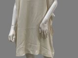 an image of a mannequin dressed in a beige dress on a gray background