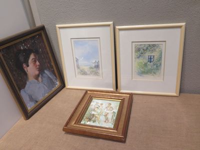 two framed pictures of a woman and a picture of a man