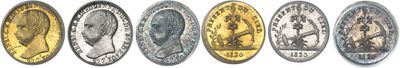 four different types of coins in a row on a white background
