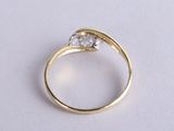 an image of a diamond ring on a white surface