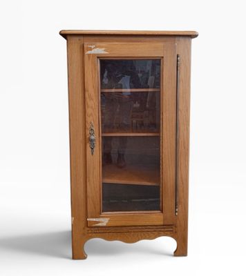 an image of a wooden cabinet with glass doors