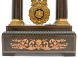a clock that is sitting on top of a table