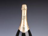 a bottle of champagne that is sitting on a table