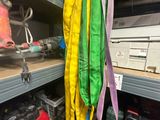 a yellow and green jacket hanging on a rack in a store