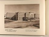 an open book with a picture of a building on it