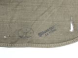 a close up of a piece of cloth with a smiley face drawn on it