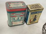 two tins that are next to each other on a table