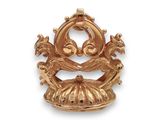 an image of a gold plated metal object with a bird on it