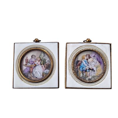 two framed pictures of a woman and a child on a white background