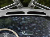 a close up of a car ' s interior with the door open