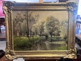 a picture of a painting on a easel in a room