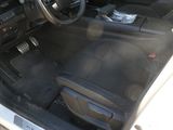 a picture of a car interior with the door open