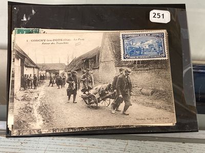 a picture of a postcard with a picture of a man pushing a wheelbarrow