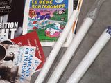 a lot of cigarettes and books on the floor