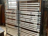 a picture of a room that has a bunch of wooden slats in it