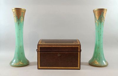 two vases sitting next to each other on a table
