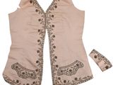 pink vest and headband with black and white designs on it