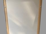 a picture of a mirror on the wall in the bathroom