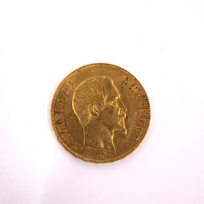 an image of a gold coin with a woman ' s head on it