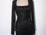 une robe noire sur un mannequin mannequin mannequin mannequin mannequin mannequin mannequin mannequin mannequin mannequin