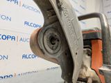 an image of a close up of a chainsaw on a table
