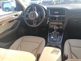 the interior of a car with a steering wheel, dashboard, and dashboard buttons