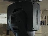 a video camera hanging from the ceiling of a building