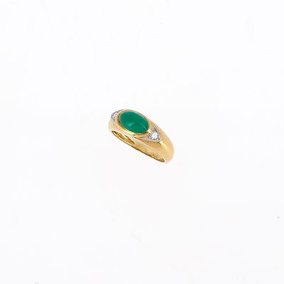 an oval emerald and diamond ring