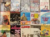 a lot of comic books on the table