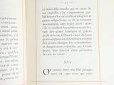 an open book with a picture of a clock on it