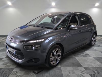 the grey citrole is parked on a checkered floor