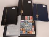 several different types of stamps are displayed in a binder