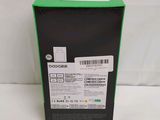 the back of a box with a green label on it