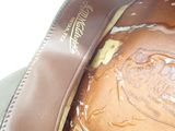 a close up of a baseball glove in a bag