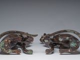 pair of bronze figurines of a bull and a bull with horns