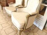 three chairs that are sitting in a room together