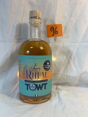 an image of a bottle of rum in front of a white background