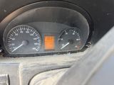 a close up of a car dashboard with a speedometer