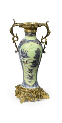 a vase with a handle on a stand on a white background