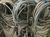 a bunch of wires that are hanging on the wall