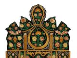 a very ornately decorated clock on display on a white background