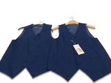 two blue vests hanging on a hanger on a white background