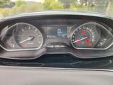 a close up of a car dashboard with a speedometer and gauges