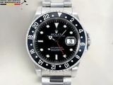 a rolex watch that is sitting on a table