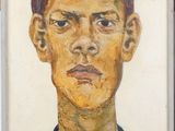 portrait d'un jeune homme vêtu d'un pull noir et d'un pull bleu