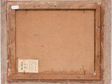 an old picture frame with a piece of paper on the bottom of it